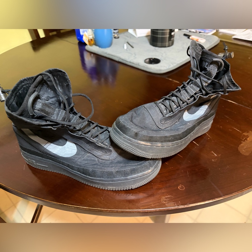 Nike Black High-Top Sneakers with White Swoosh Accent
